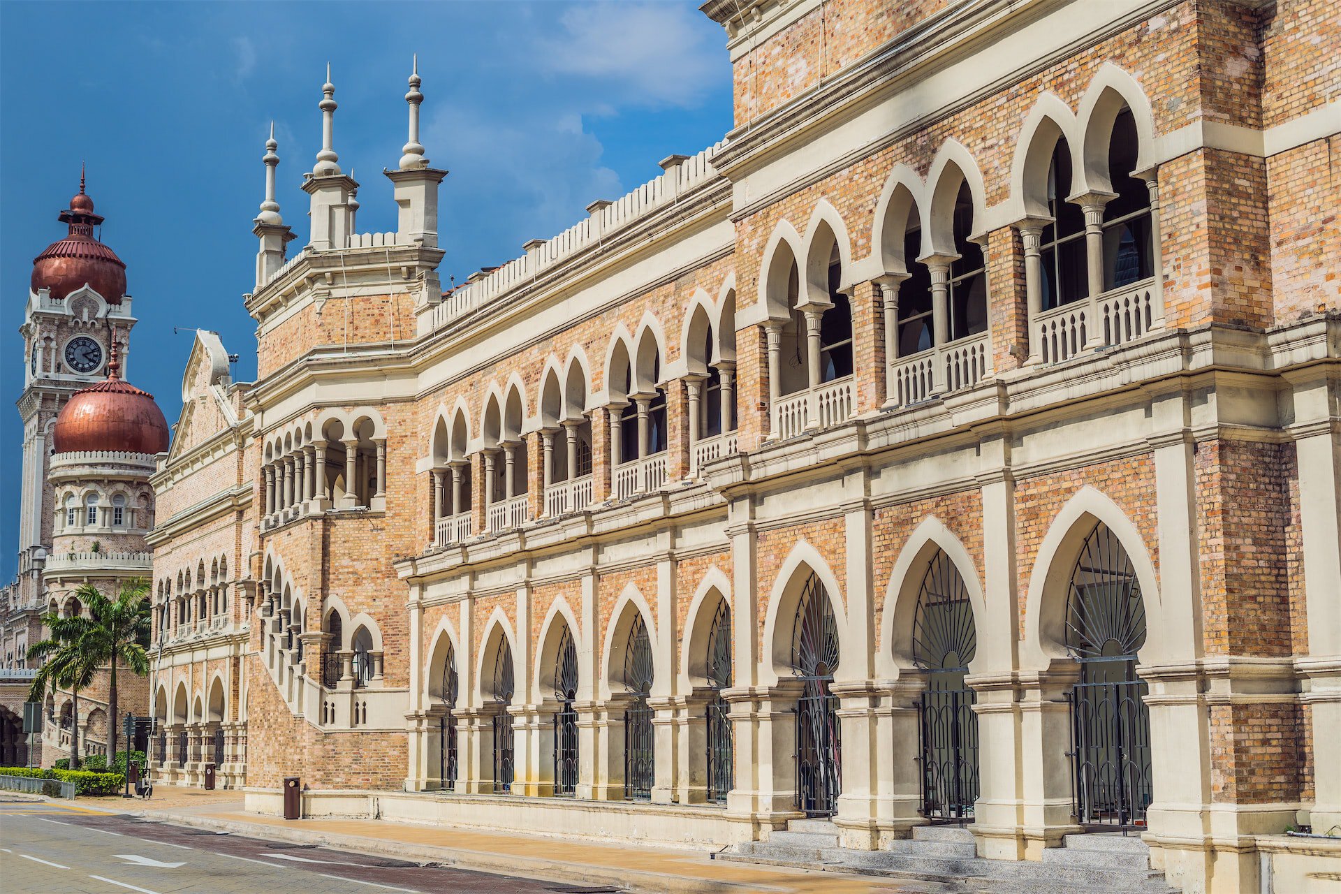 Historic Sultan Abdul Samad Building showing Moorish arches and a copper dome, highlighting Malaysia's heritage tourism.